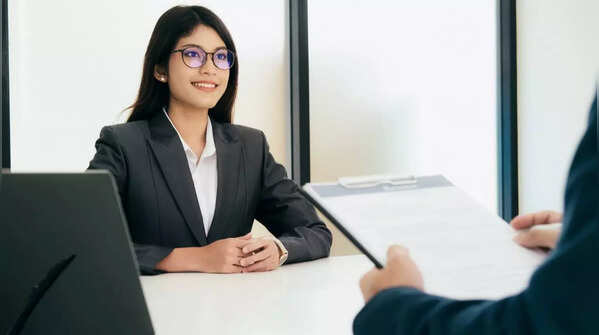 Thoughtful pause during an interview.