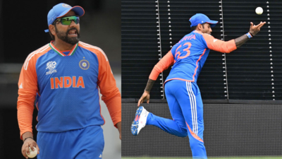 Rohit Sharma watching Suryakumar Yadav take a catch.