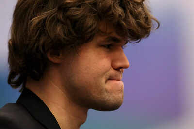 Magnus Carlsen faces unexpected challenge from young chess player.