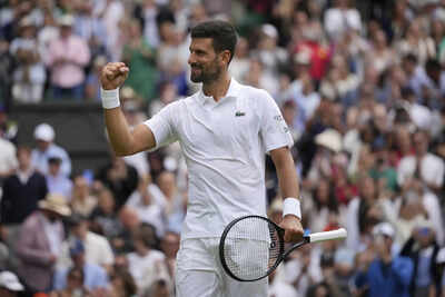 Novak Djokovic celebrates his victory over Alex de Minaur at Wimbledon 2025.